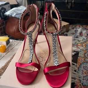 Hot pink heels  only worn once for a wedding.